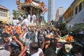 Devotees make their offering for lord Murugan in silver chariot in front Sri Kamatchi Amman Temple. Royalty Free Stock Photo